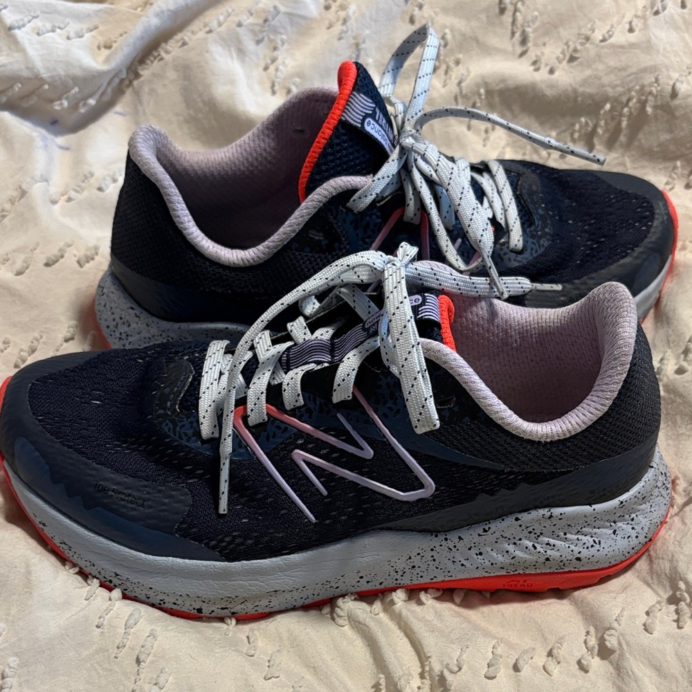 New Balance Black and Gray Sneakers with Red Accents